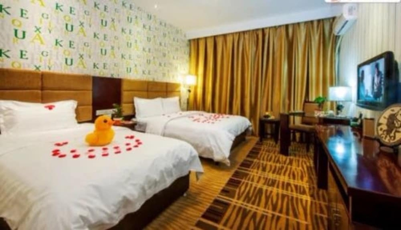 Imagen de la habitación del Hotel Dunhuang Golden Leaf. Foto 10