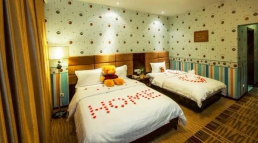 Imagen de la habitación del Hotel Dunhuang Golden Leaf. Foto 11