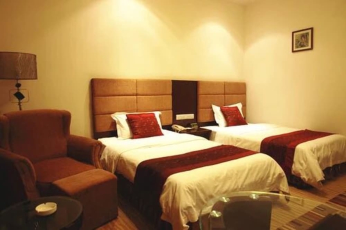 Imagen de la habitación del Hotel Dunhuang Golden Leaf. Foto 12