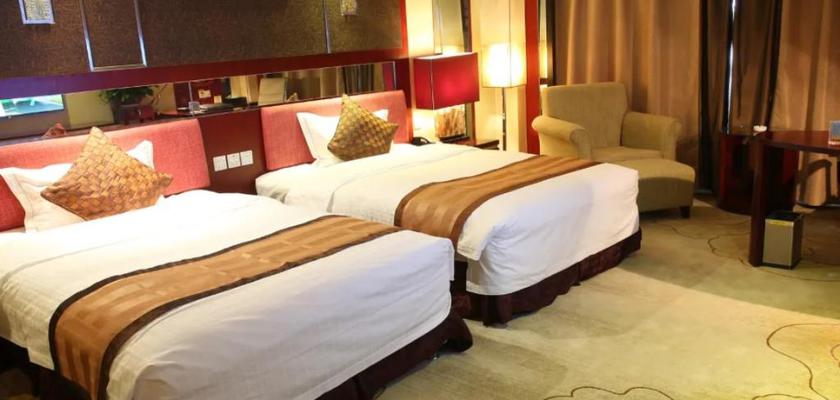 Imagen de la habitación del Hotel Dunhuang Grand Soluxe Hotel. Foto 8