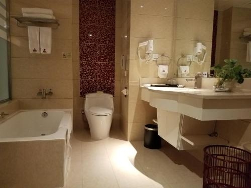 Imagen de la habitación del Hotel Dunhuang Grand Sun. Foto 9