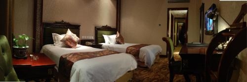 Imagen de la habitación del Hotel Dunhuang Grand Sun. Foto 10