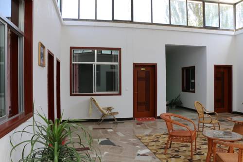 Imagen de la habitación del Hotel Dunhuang Hu Yang Inn. Foto 2