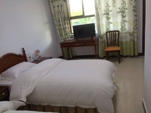 Imagen de la habitación del Hotel Dunhuang Hu Yang Inn. Foto 6