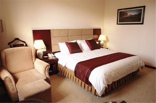 Imagen de la habitación del Hotel Dunhuang Jin Ye. Foto 1