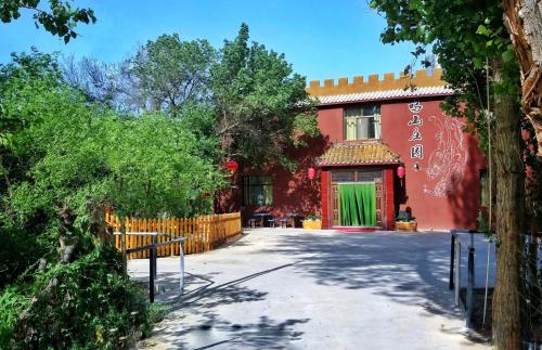 Imagen de la habitación del Hotel Dunhuang Mingshan Masion. Foto 10