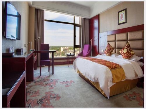 Imagen de la habitación del Hotel Dunhuang Silk Road Yiyuan. Foto 7