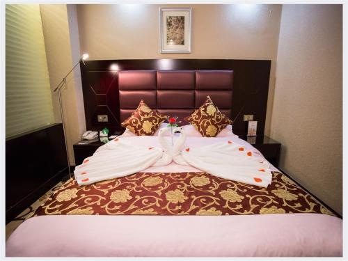 Imagen de la habitación del Hotel Dunhuang Silk Road Yiyuan. Foto 8