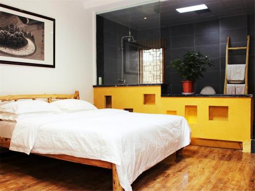 Imagen de la habitación del Hotel Dunhuang Silk Yododo Inn. Foto 6