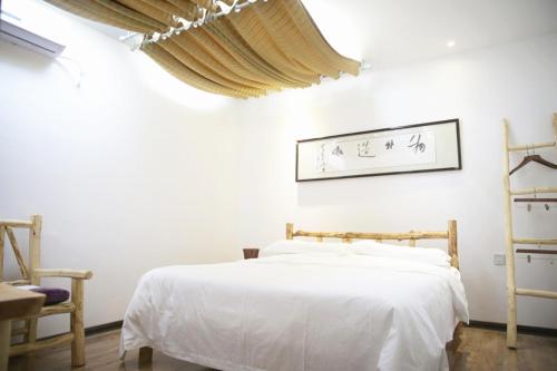 Imagen de la habitación del Hotel Dunhuang Silk Yododo Inn. Foto 8