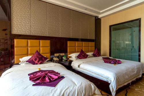 Imagen de la habitación del Hotel Dunhuang Suyuan. Foto 6