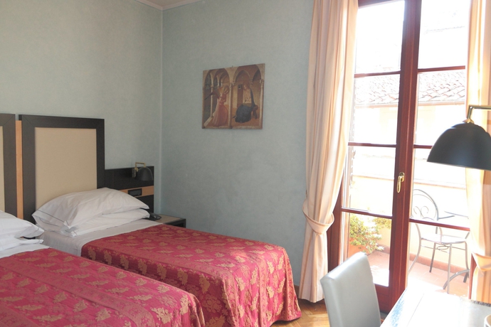 Imagen de la habitación del Hotel Duomo Firenze. Foto 4