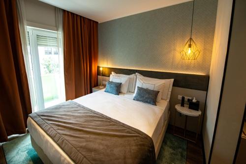 Imagen de la habitación del Hotel Duplo Charme Boutique. Foto 5