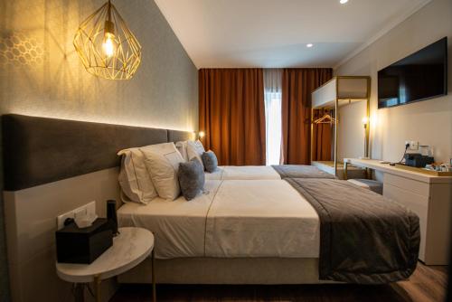 Imagen de la habitación del Hotel Duplo Charme Boutique. Foto 6