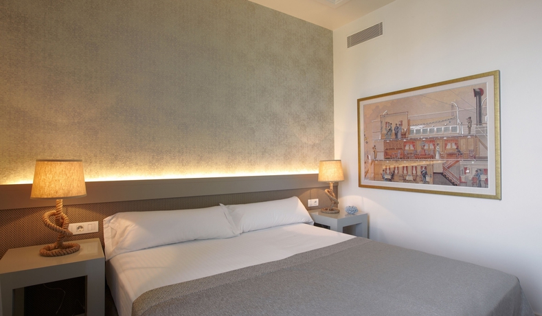 Imagen de la habitación del Hotel Duquesa Suites Barcelona. Foto 3