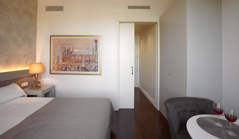 Imagen de la habitación del Hotel Duquesa Suites Barcelona. Foto 9