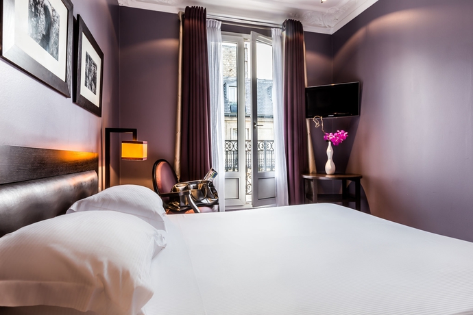 Imagen de la habitación del Hotel Duret Paris. Foto 4