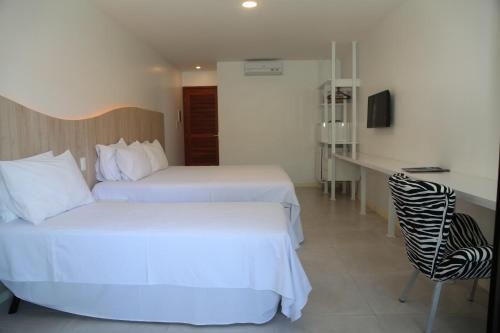 Imagen de la habitación del Hotel Duro Beach Garden. Foto 7