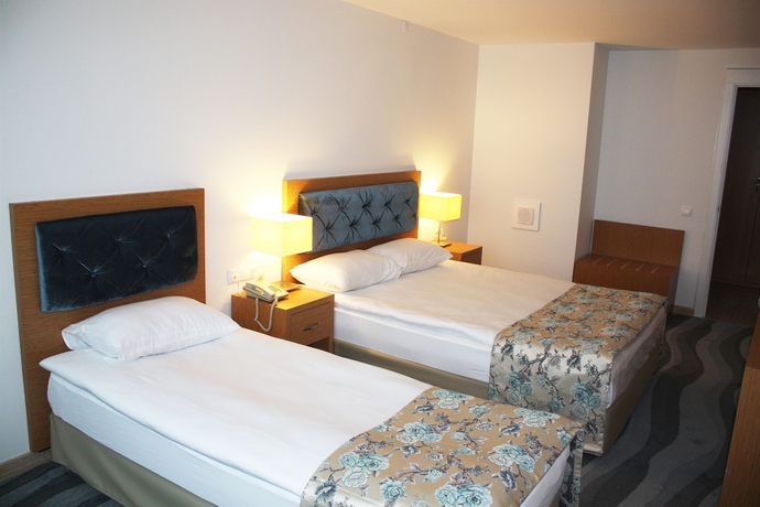 Imagen de la habitación del Hotel Duru Suites. Foto 5