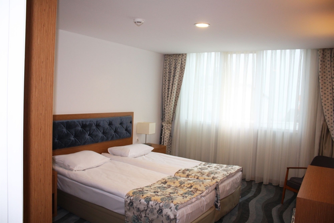 Imagen de la habitación del Hotel Duru Suites. Foto 9