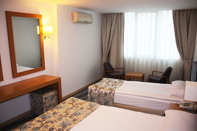 Imagen de la habitación del Hotel Duru Suites. Foto 11