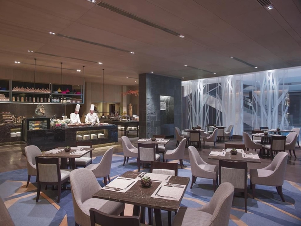 Imagen del bar/restaurante del Hotel Dusit Devarana Hot Springs And Spa Conghua. Foto 6