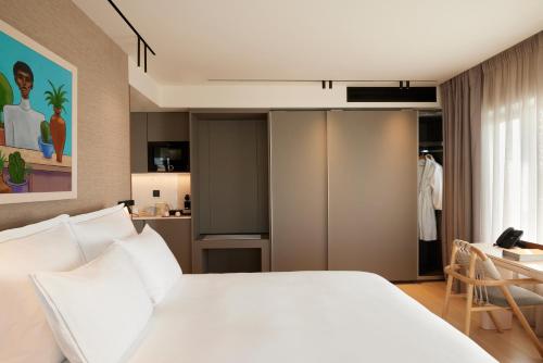 Imagen de la habitación del Hotel Dusit Suites Athens, Glyfada. Foto 11
