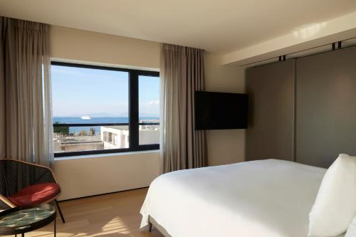 Imagen de la habitación del Hotel Dusit Suites Athens, Glyfada. Foto 12