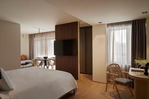 Imagen de la habitación del Hotel Dusit Suites Athens, Glyfada. Foto 13