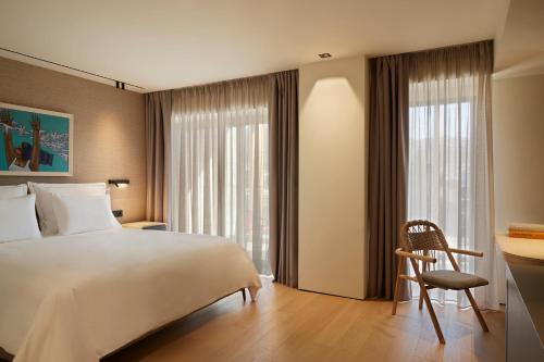Imagen de la habitación del Hotel Dusit Suites Athens, Glyfada. Foto 14