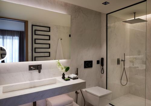 Imagen de la habitación del Hotel Dusit Suites Athens, Glyfada. Foto 19