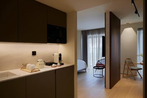 Imagen de la habitación del Hotel Dusit Suites Athens, Glyfada. Foto 20