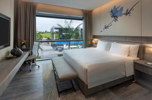 Imagen de la habitación del Hotel Dusit Thani Laguna Singapore. Foto 9