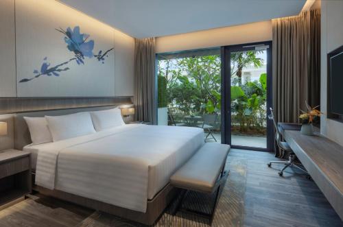 Imagen de la habitación del Hotel Dusit Thani Laguna Singapore. Foto 11