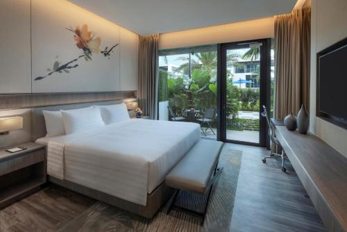 Imagen de la habitación del Hotel Dusit Thani Laguna Singapore. Foto 12