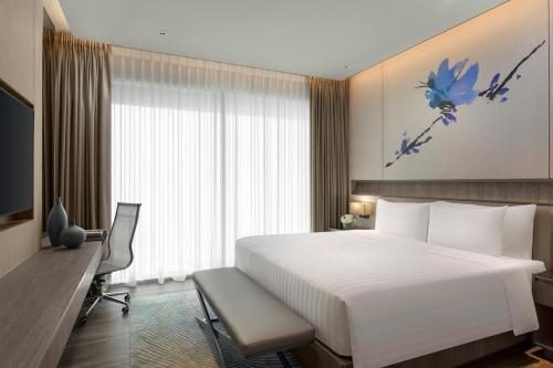 Imagen de la habitación del Hotel Dusit Thani Laguna Singapore. Foto 14