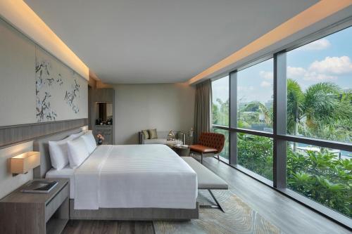 Imagen de la habitación del Hotel Dusit Thani Laguna Singapore. Foto 18