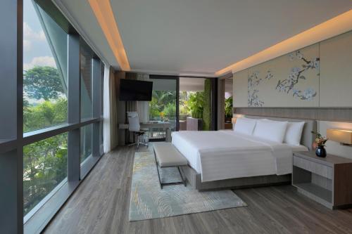 Imagen de la habitación del Hotel Dusit Thani Laguna Singapore. Foto 19