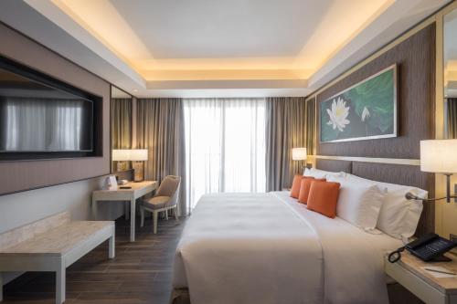 Imagen de la habitación del Hotel Dusit Thani Mactan Cebu Resort. Foto 11