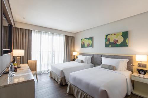 Imagen de la habitación del Hotel Dusit Thani Mactan Cebu Resort. Foto 20