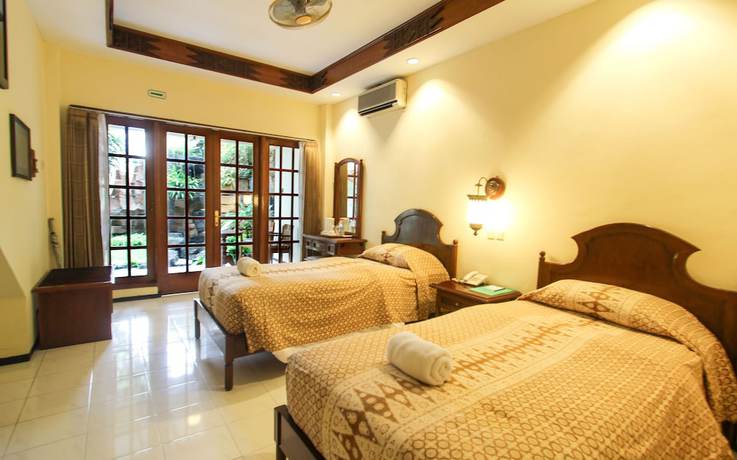 Imagen de la habitación del Hotel Duta Garden Hotel. Foto 3