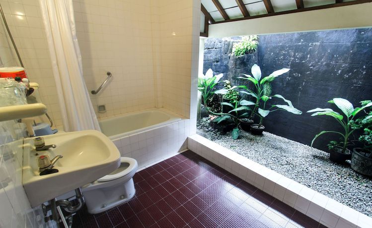 Imagen de la habitación del Hotel Duta Garden Hotel. Foto 5