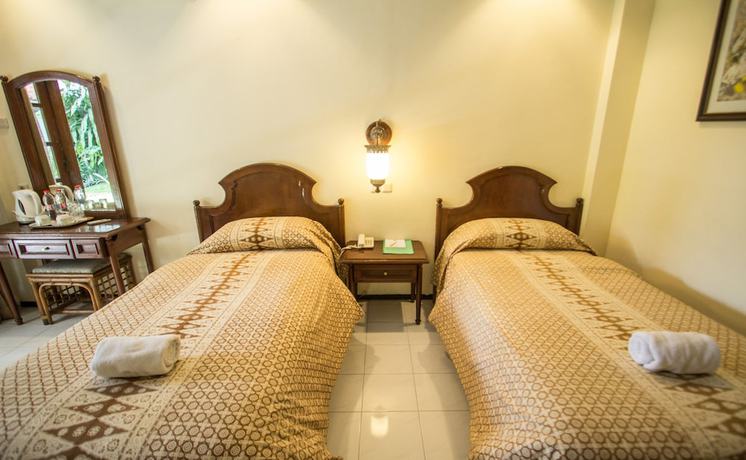 Imagen de la habitación del Hotel Duta Garden Hotel. Foto 7