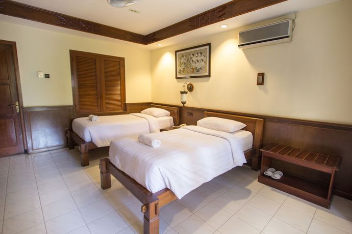Imagen de la habitación del Hotel Duta Garden Hotel. Foto 8