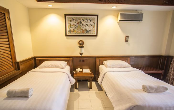Imagen de la habitación del Hotel Duta Garden Hotel. Foto 9