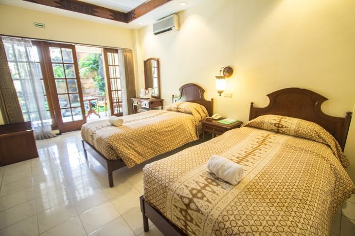 Imagen de la habitación del Hotel Duta Garden Hotel. Foto 11