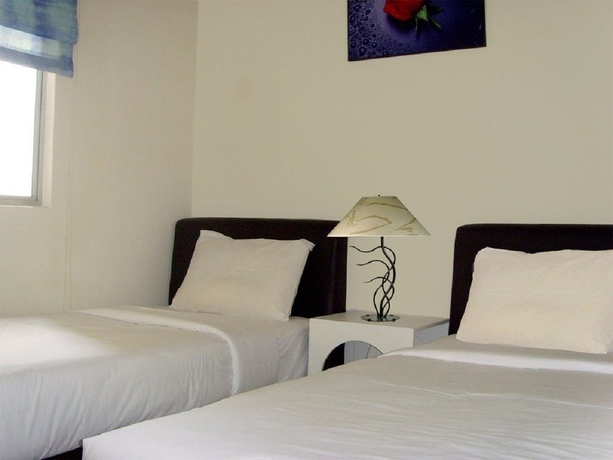 Imagen de la habitación del Hotel Duta and Residence. Foto 1
