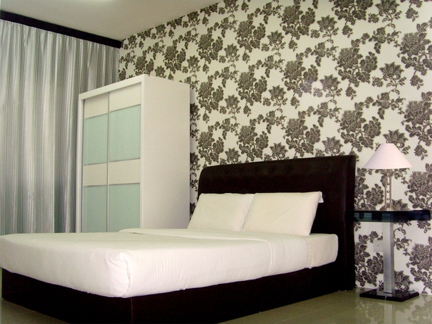 Imagen de la habitación del Hotel Duta and Residence. Foto 2