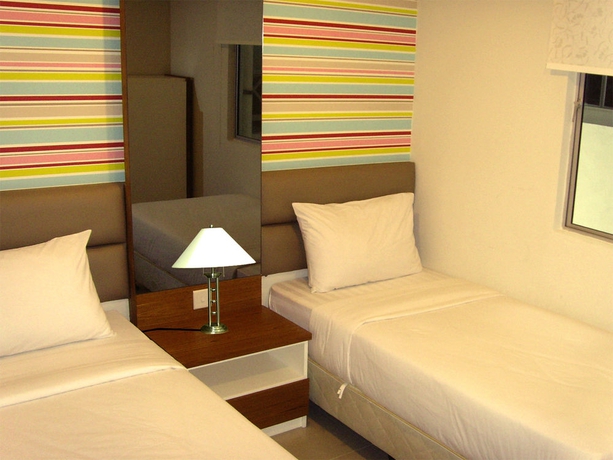 Imagen de la habitación del Hotel Duta and Residence. Foto 6