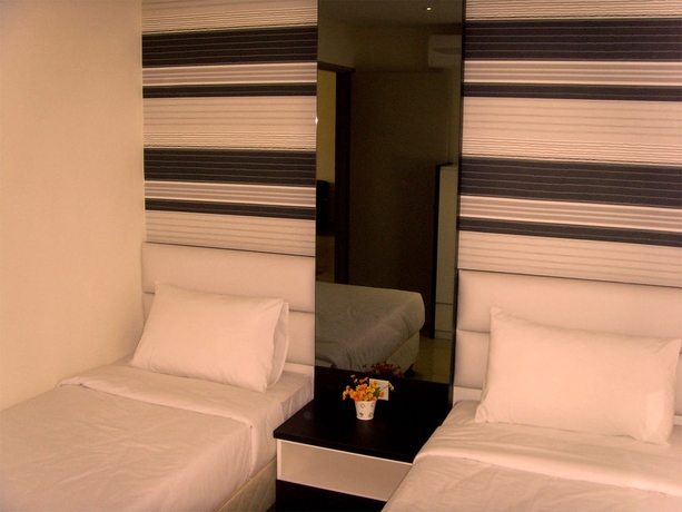 Imagen de la habitación del Hotel Duta and Residence. Foto 11